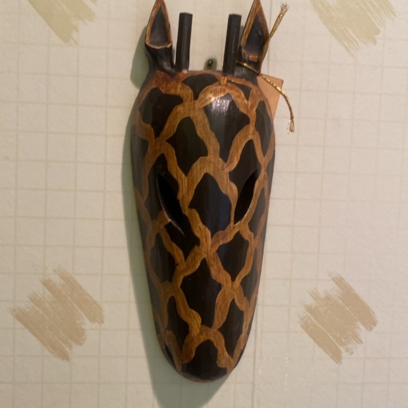 Hand Painted Wooden African Animal Wall Decor
Giraffe Mask Made in Indonesia - Picture 1 of 12